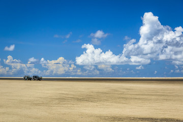 A ride on the sands in a traction touring car