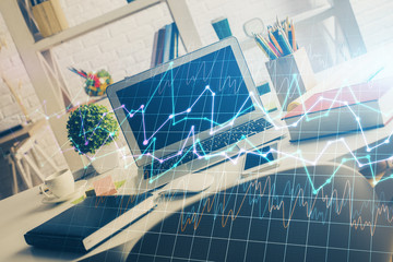 Multi exposure of chart and financial info and work space with computer background. Concept of international online trading.
