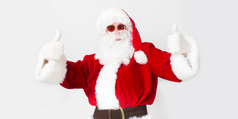Santa showing thumbs up and greeting warm countries on white