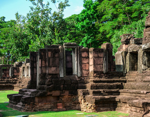 Fototapeta premium Landscape Phimai Prasat wall of Khmer prosperity. Historical sites in Thailand with trees and sky as background.