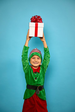 Boy  in Santa's elf costume