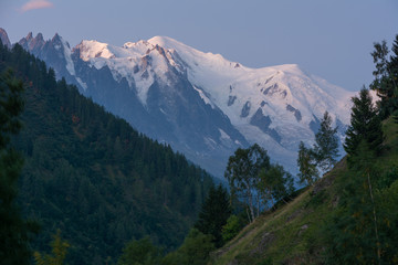 Evening and morning view of the town of Chamonix and Mount Mont Blanc.	