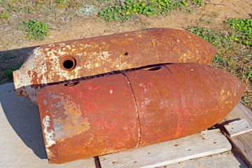 Old rusted World War II ammunition shell of artillery