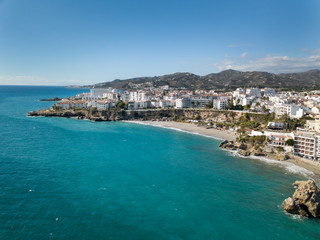 Beautiful aerial panoramic view of Nerja city from Costa del Sol Spain a Top touristic holiday destination - obrazy, fototapety, plakaty