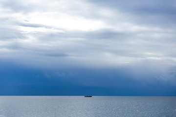 Landscape view over the Mediterranean Sea in a cloudy , capricious, storming day