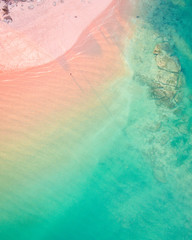 An aerial photograph of the pristine turquoise water and the beautiful coastline of Broome in...