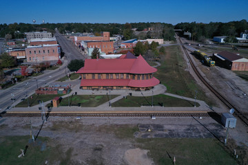 Fototapeta premium Aerial view of the Old Hamlet NC Train depot. Serving as the terminal for Amtrak. Old historic building.