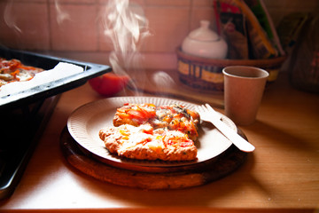 homemade pizza on a baking sheet, disposable tableware, concept zero plastic