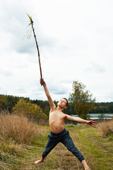 little cute boy playing outside like wild indian chief, lifestyle real people concept