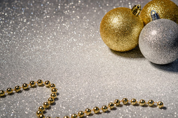  gold and silver christmas balls on a beautiful background2