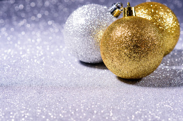  gold and silver christmas balls on a beautiful background2