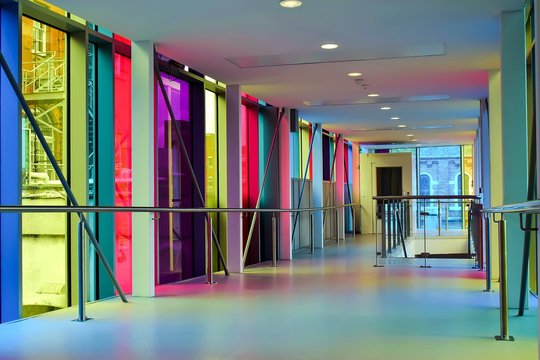 Beautiful Shot Of A Modern Building With Colorful Glass Windows