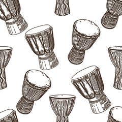 Vector hand drawn seamless pattern of African drums in the style of engraving on white background. - obrazy, fototapety, plakaty
