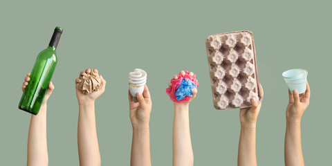 Ecology human hand holding stuff for recycle