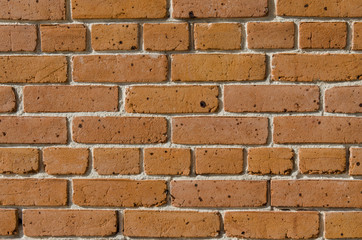 Brick wall, excellent rustic abstract background or backdrop. Color and detail in this beautiful vintage brick wall, built years ago.