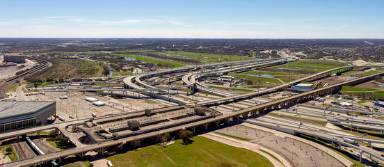Dallas, Texas skyline cityscape massive construction of highways and overpasses transportation infrastructure.