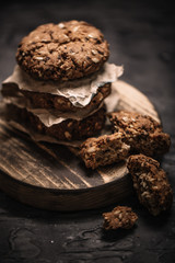 Sweet cookies with on dark textured background.