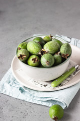 Green feijoa. Berries of the guava family. Tropical fruit. Healthy vegetarian food. Copy space.