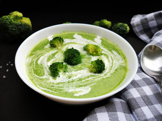 Bowl of broccoli soup with coconut cream