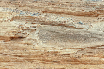 Obraz na płótnie Canvas Stone texture. Stone old wall. Granite natural surface. Texture pattern. Natural stone close-up. Structural surface close-up.