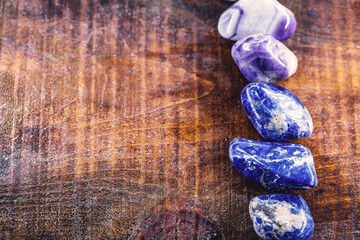 Fototapeta na wymiar Sodalite is a rare mineral usually blue or bluish-violet in color, widely used as a gemstone and in ornamental objects. Stone used in alternative health treatment.