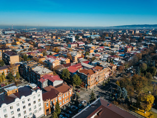 Obraz premium Vladikavkaz, capital of North Ossetia. Panorama of historical downtown from drone flight