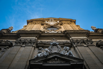 Fototapeta na wymiar Statue on the wall of the church of Saints Michael and Cajetan, Florence, Italy
