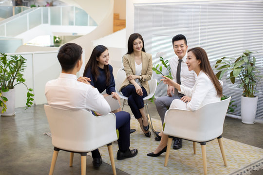 Chinese business people having a meeting in office