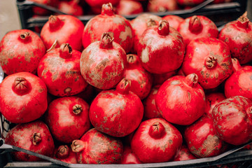  tasty ripe red pomegranate on the food market