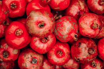 tasty ripe red pomegranate on the food market