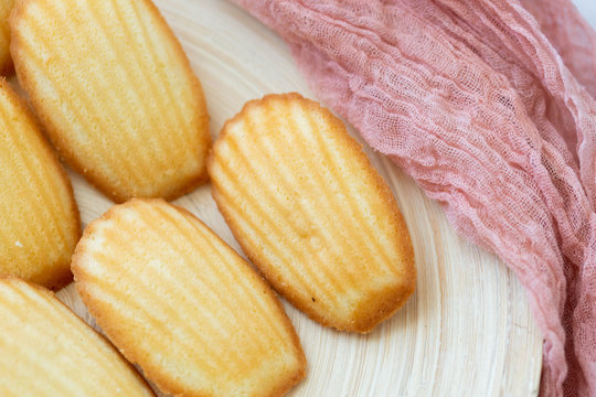 Plate of Madeleines on Marble Background