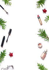 Winter holiday beauty or cosmetic concept frame on the white background. Shopping  make up for Christmas or New Year  celebration. Copy space