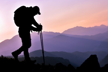 climber hiking in the magnificent mountains