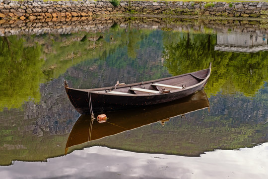 lonely boat on the lake in Laerdsl, Norway. July 2019