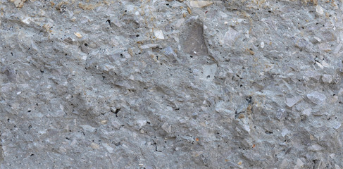 Texture of concrete wall background closeup, rock