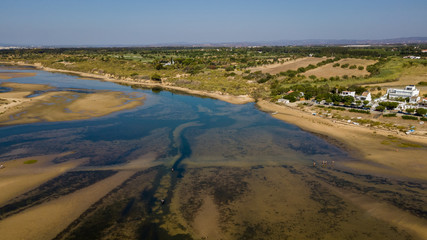 Aerial. View from the sky of the beach of Fabrica  Cancela Velha, Vila Real Santo Antonio. Portugal Algarve