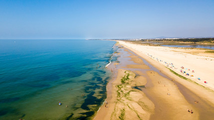 Fototapeta na wymiar Aerial. View from the sky of the beach of Fabrica Cancela Velha, Vila Real Santo Antonio. Portugal Algarve