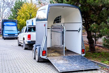 horse vehicle .  Carriage for horses . Auto trailer for transportation of horses . transportation...