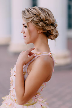 Wedding hairstyle bride with braided view profile