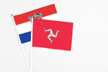 Isle Of Man and Croatia stick flags on white background. High quality fabric, miniature national...