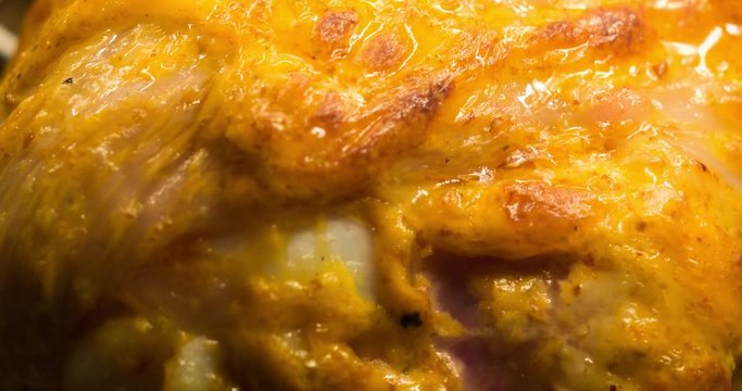 Chicken in Creamy Sauce Cooking Inside of Convection Oven Extreme Close-up Time Lapse