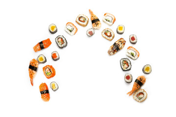 Composition with different sushi on white background
