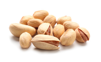 Tasty pistachio nuts isolated on white