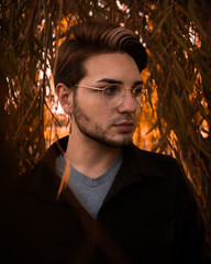 Beautiful gay male model at sunset in Kansas City Park