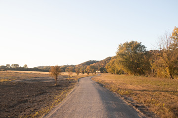 Park trail and field at sunset in Kansas City. 