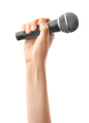 Female hand with microphone on white background