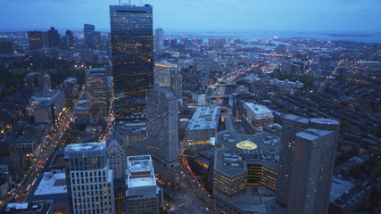 an evening view of the financial district of boston from the observation deck of skywalk in boston