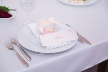 Table appointsment in restaurant. Wedding decoration in pink style