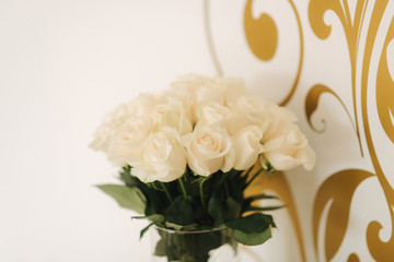 Floral decoration on the wedding ceremony by the restaurant. Pink and white color of rose. Elegant decor on charming wedding