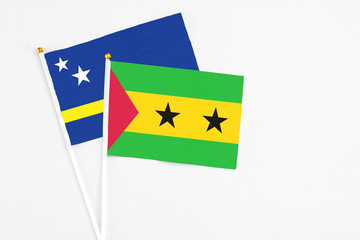 Sao Tome And Principe and Curacao stick flags on white background. High quality fabric, miniature...